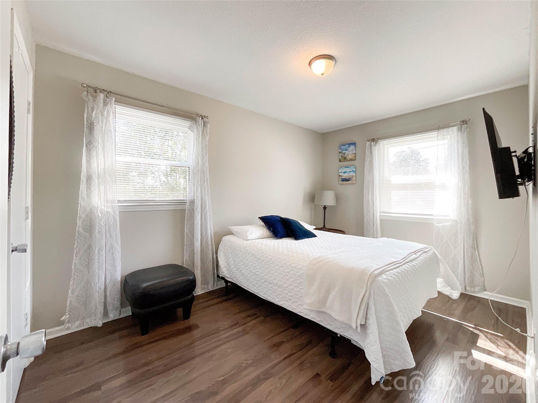 8004 Idlewild Road Indian Trail, NC 28079 - Photo 28 of 33 a bedroom with a bed and a window