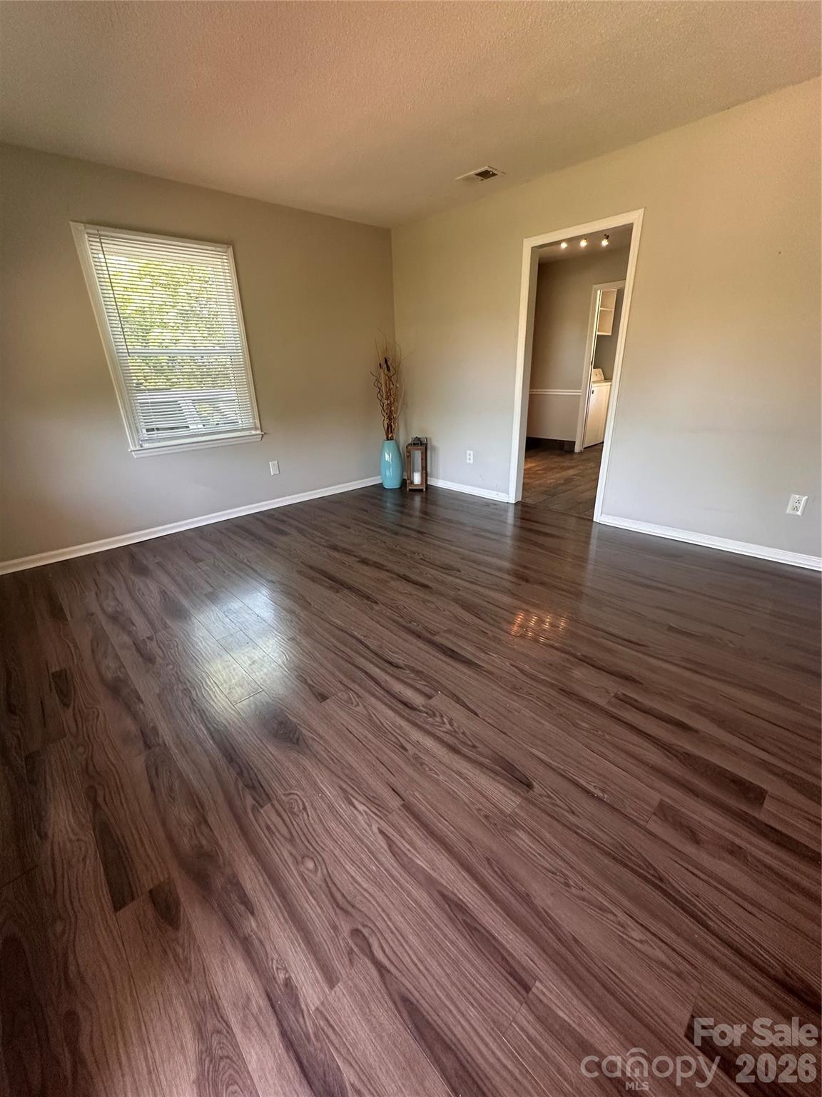 8004 Idlewild Road Indian Trail, NC 28079 - Photo 10 of 33 a view of empty room with wooden floor