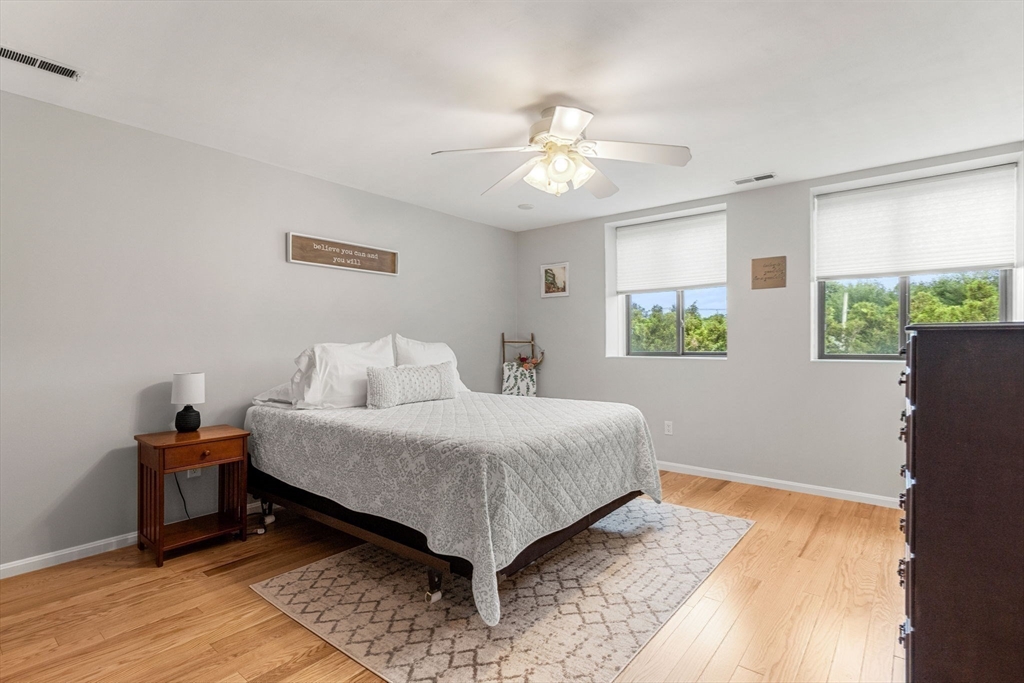 30 Conant Street, Unit 2D Beverly, MA 01915 - Photo 11 of 17 a bedroom with bed and window