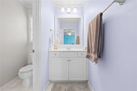 a view of a house with backyard porch and sitting area