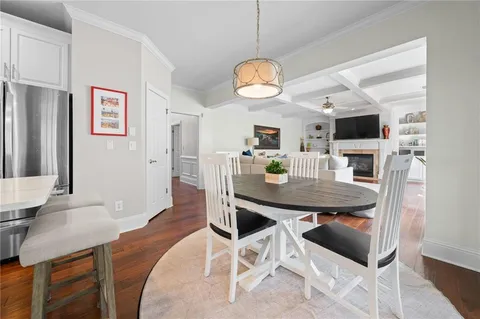 a living room with furniture window and wooden floor