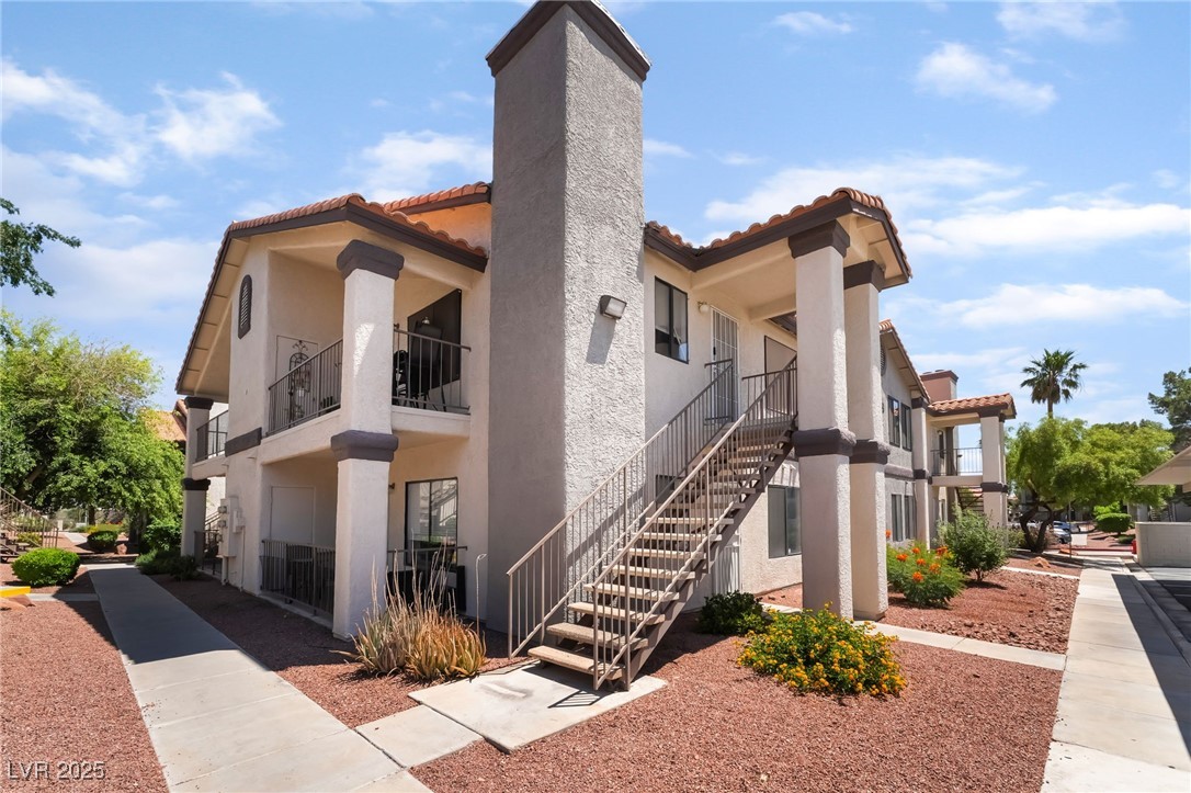 1575 West Warm Springs Road, Unit 2822 Henderson, NV 89014 - Photo 3 of 37 View of property with stairway