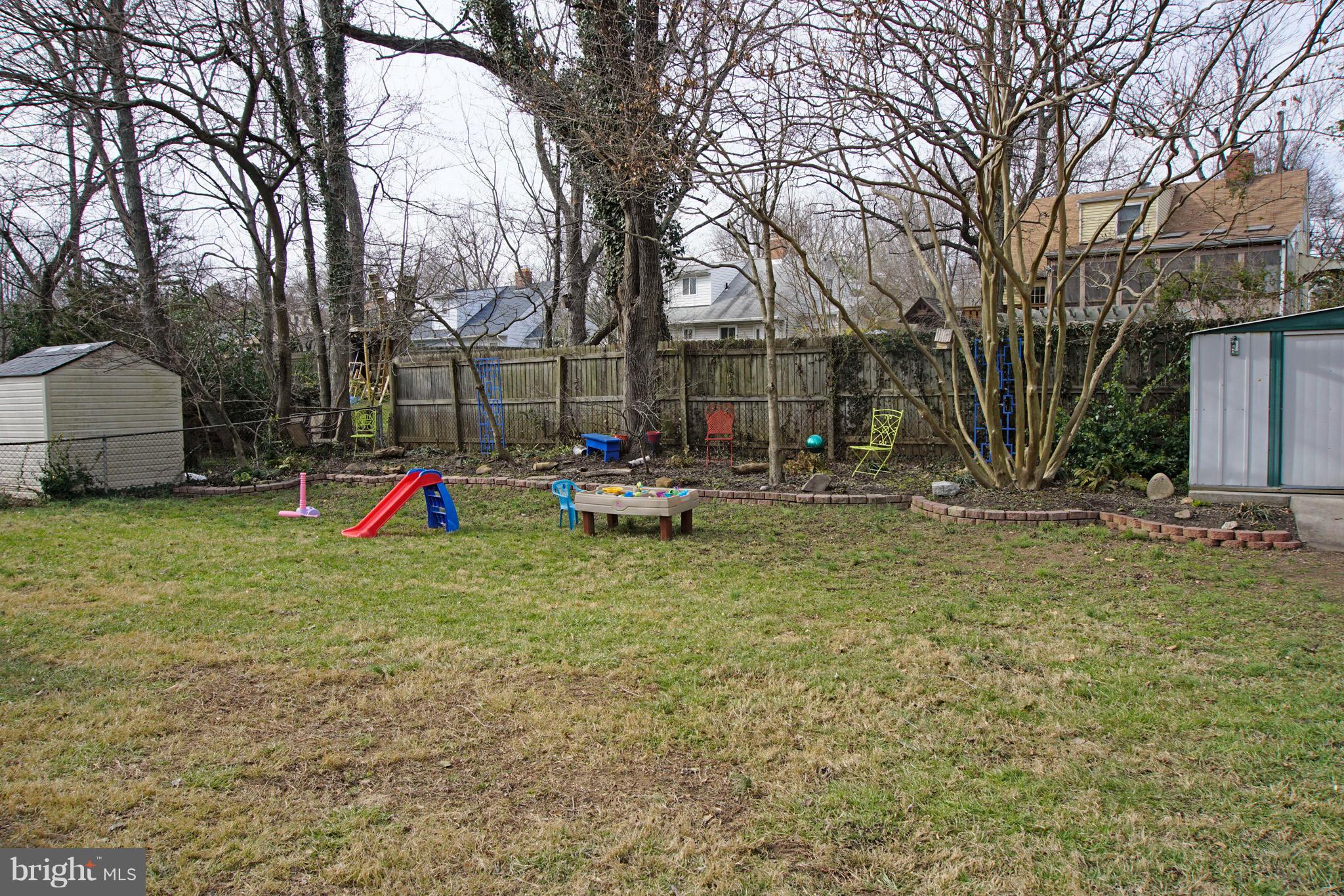 911 Dryden Street Silver Spring, MD 20901 - Photo 22 of 24 Backyard overlooking woodland landscaping