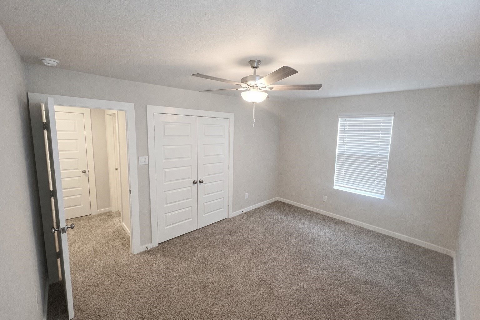 5715 Madden Lane Houston, TX 77048 - Photo 14 of 16 a view of an empty room with a window