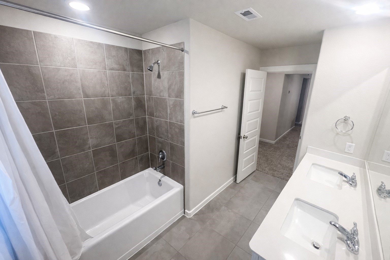 5715 Madden Lane Houston, TX 77048 - Photo 16 of 16 a bathroom with a bathtub and a shower