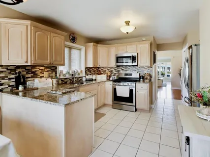 $575,000 | 8547 West St Joseph Avenue, Chicago, IL 60656