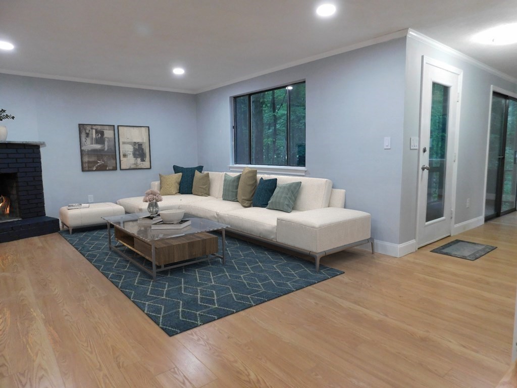 80 Mountain Gate Road, Unit 80 Ashland, MA 01721 - Photo 13 of 42 a living room with furniture and a couch