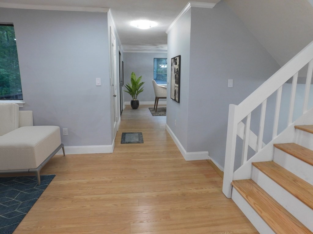 80 Mountain Gate Road, Unit 80 Ashland, MA 01721 - Photo 14 of 42 a view of a living room and entryway