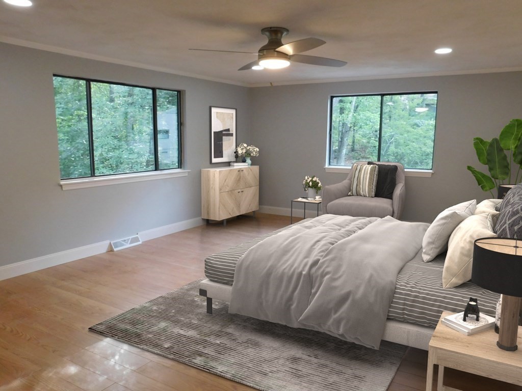 80 Mountain Gate Road, Unit 80 Ashland, MA 01721 - Photo 18 of 42 a bed room with a bed and a chair