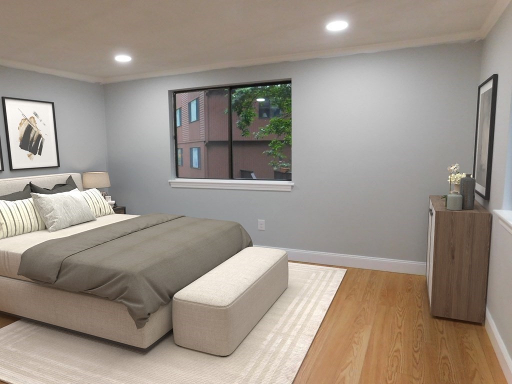 80 Mountain Gate Road, Unit 80 Ashland, MA 01721 - Photo 19 of 42 a bedroom with bed and a window