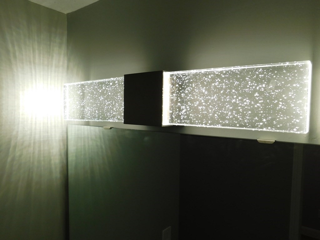 80 Mountain Gate Road, Unit 80 Ashland, MA 01721 - Photo 27 of 42 a view of an empty room with wooden floor