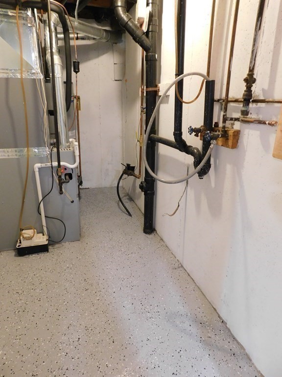 80 Mountain Gate Road, Unit 80 Ashland, MA 01721 - Photo 32 of 42 a view of a room with gym equipment