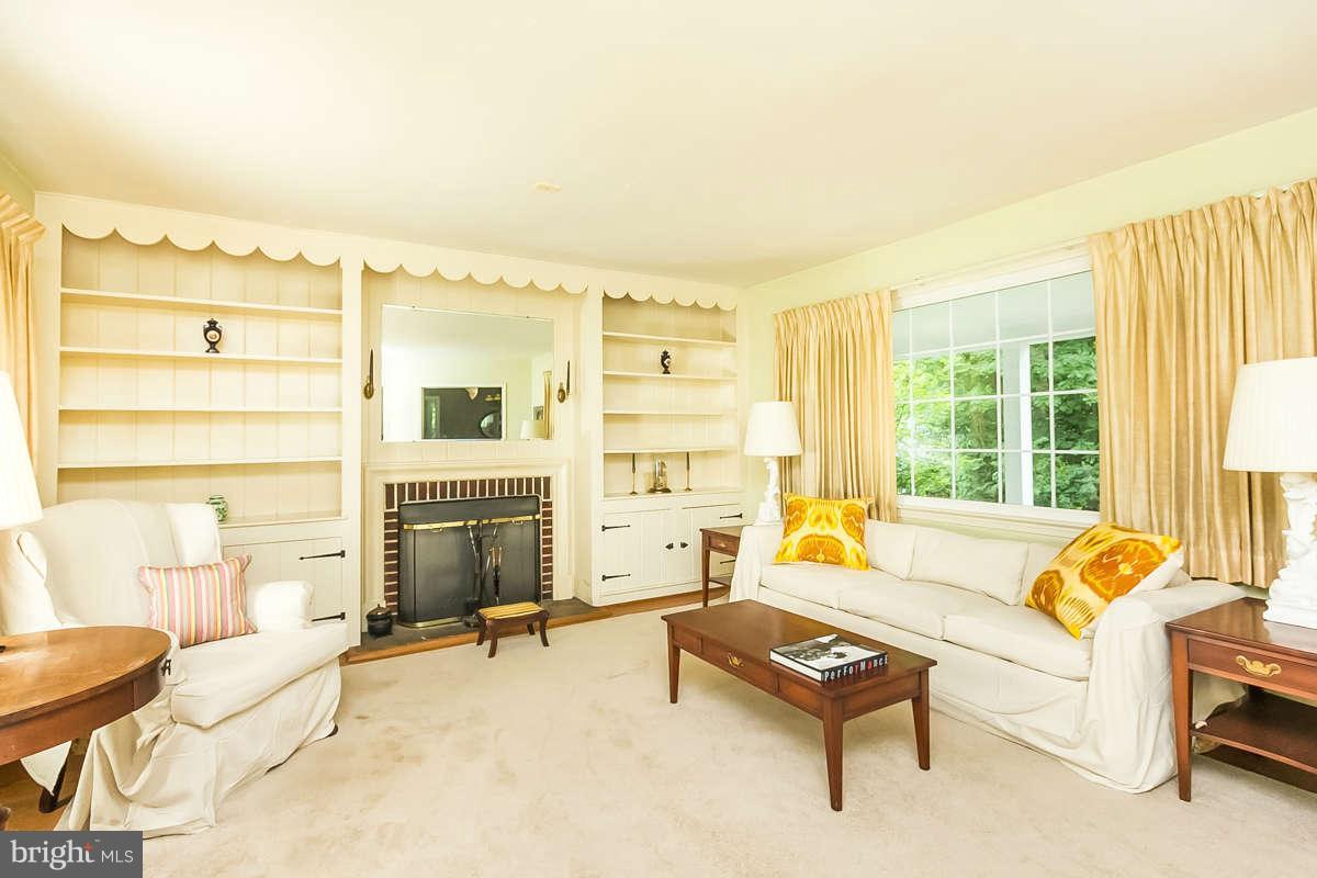4013 Buckingham Road Pikesville, MD 21207 - Photo 2 of 29 Living Room with wood burning fireplace