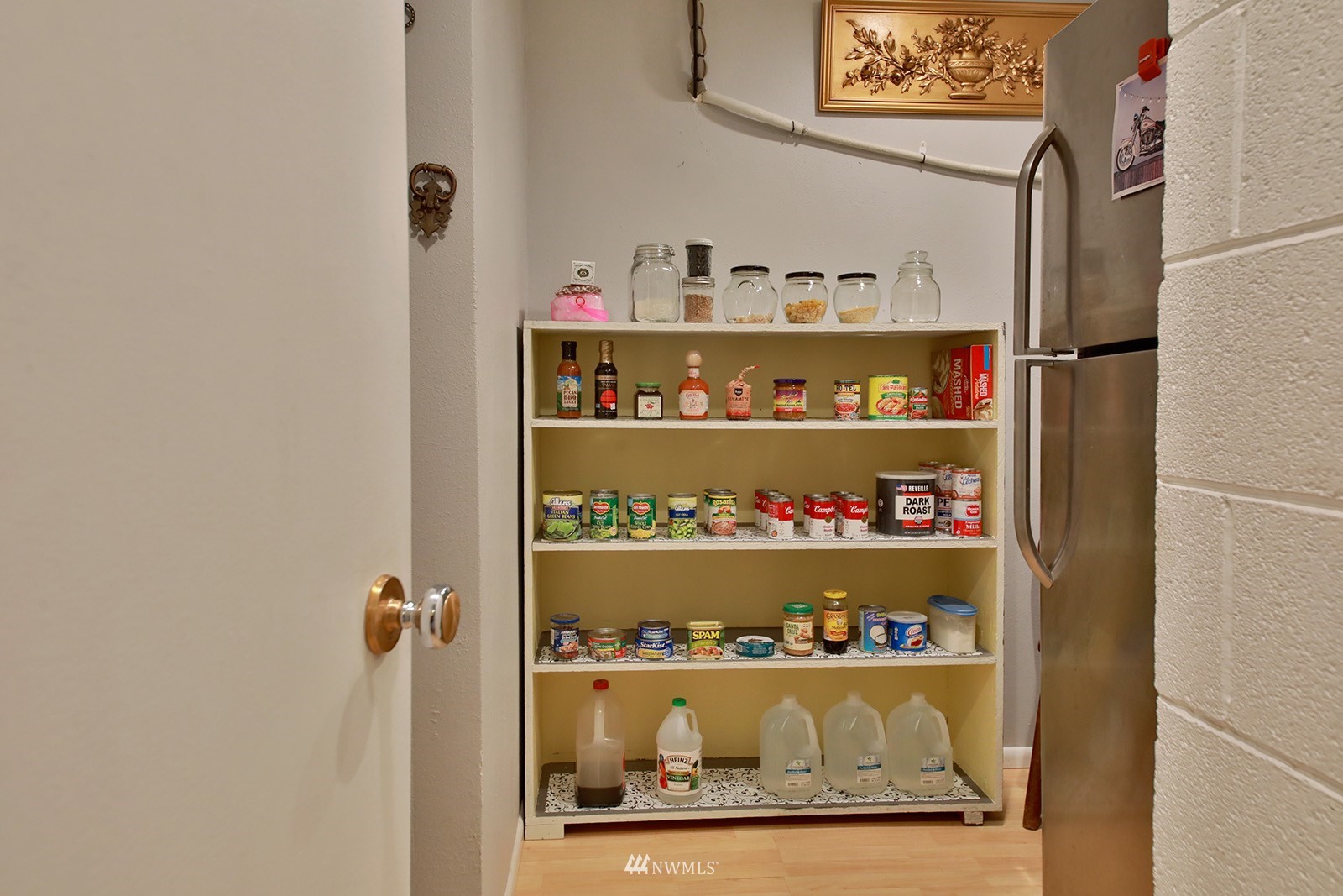 1294 Bonnie View Acres Road Oak Harbor, WA 98277 - Photo 14 of 39 a shelf with cup and plates