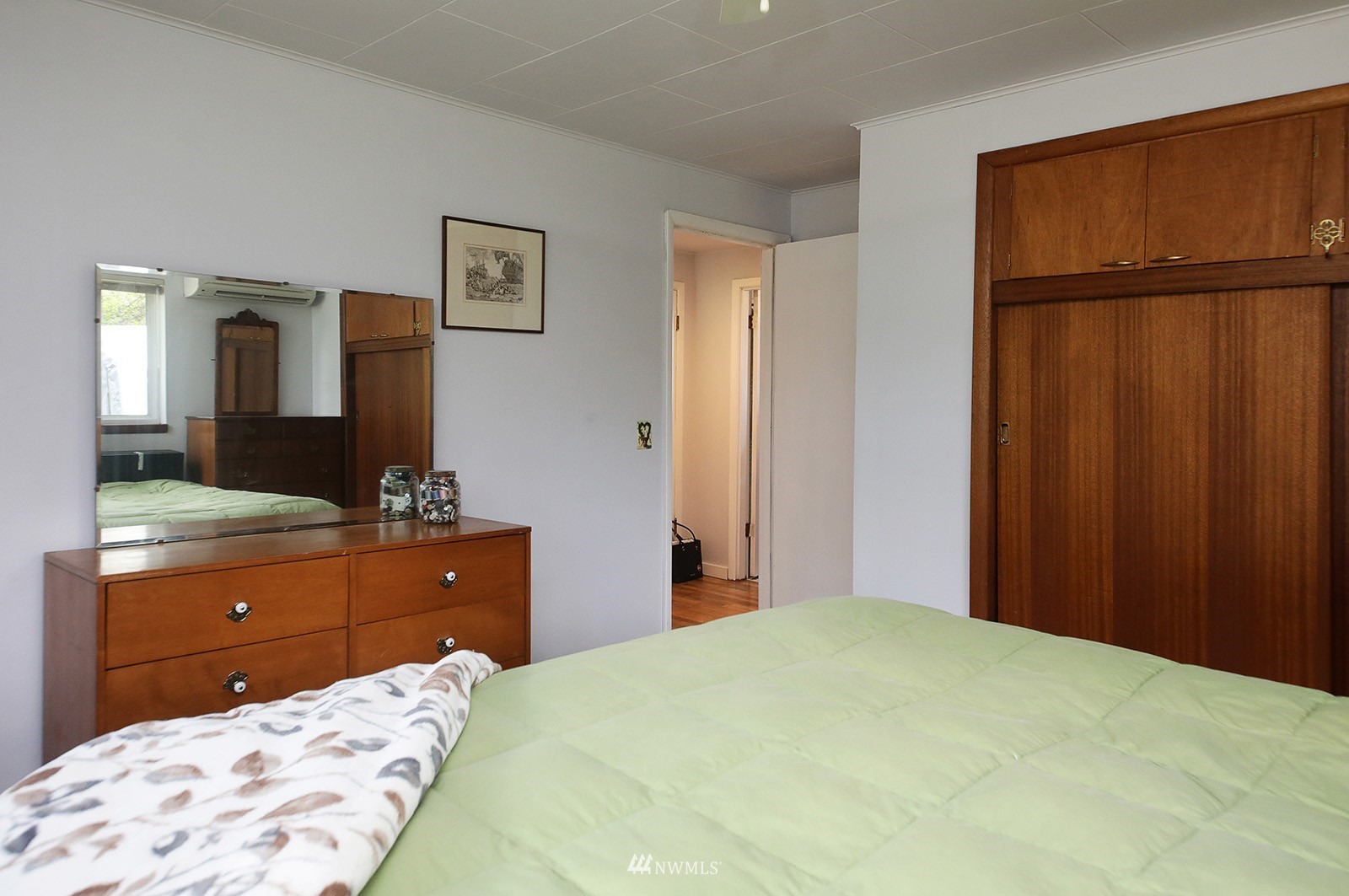 1294 Bonnie View Acres Road Oak Harbor, WA 98277 - Photo 20 of 39 a bedroom with a bed and cabinet