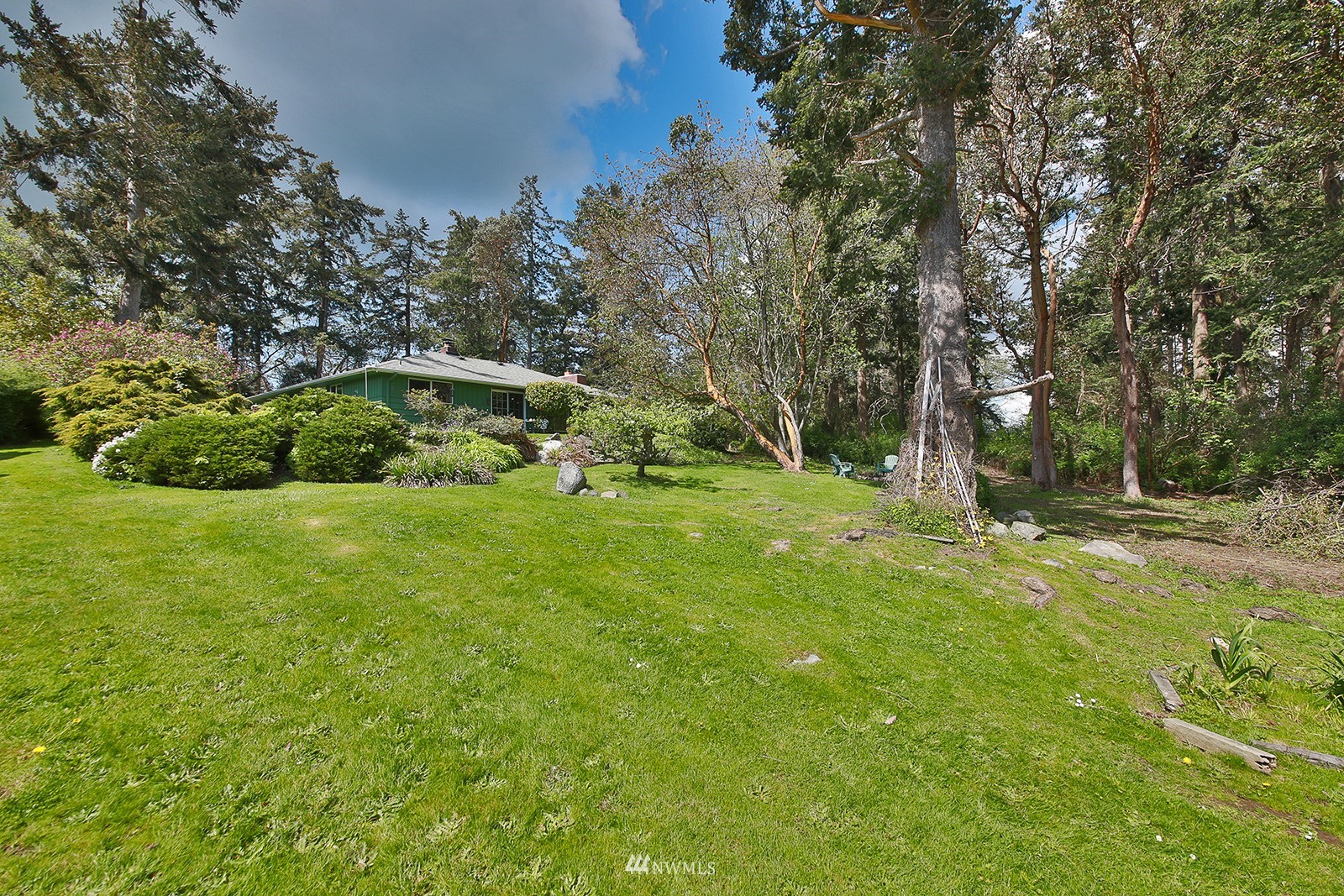 1294 Bonnie View Acres Road Oak Harbor, WA 98277 - Photo 30 of 39 a view of a garden with trees