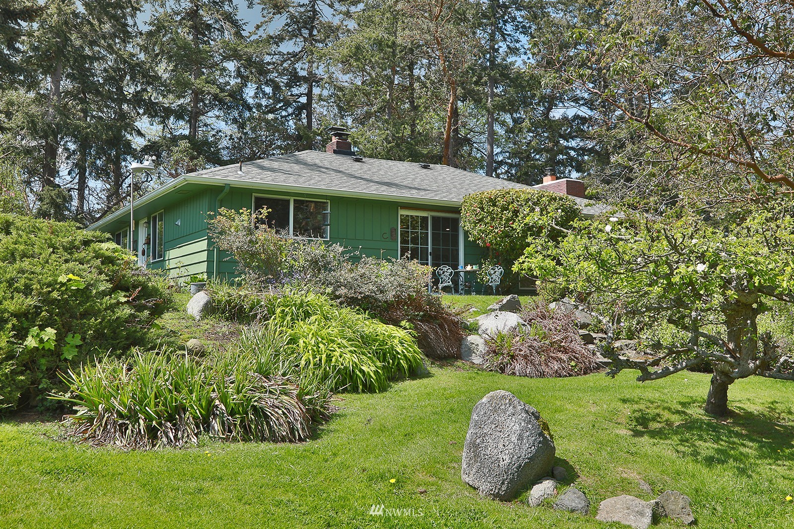1294 Bonnie View Acres Road Oak Harbor, WA 98277 - Photo 31 of 39 a backyard of a house with lots of green space