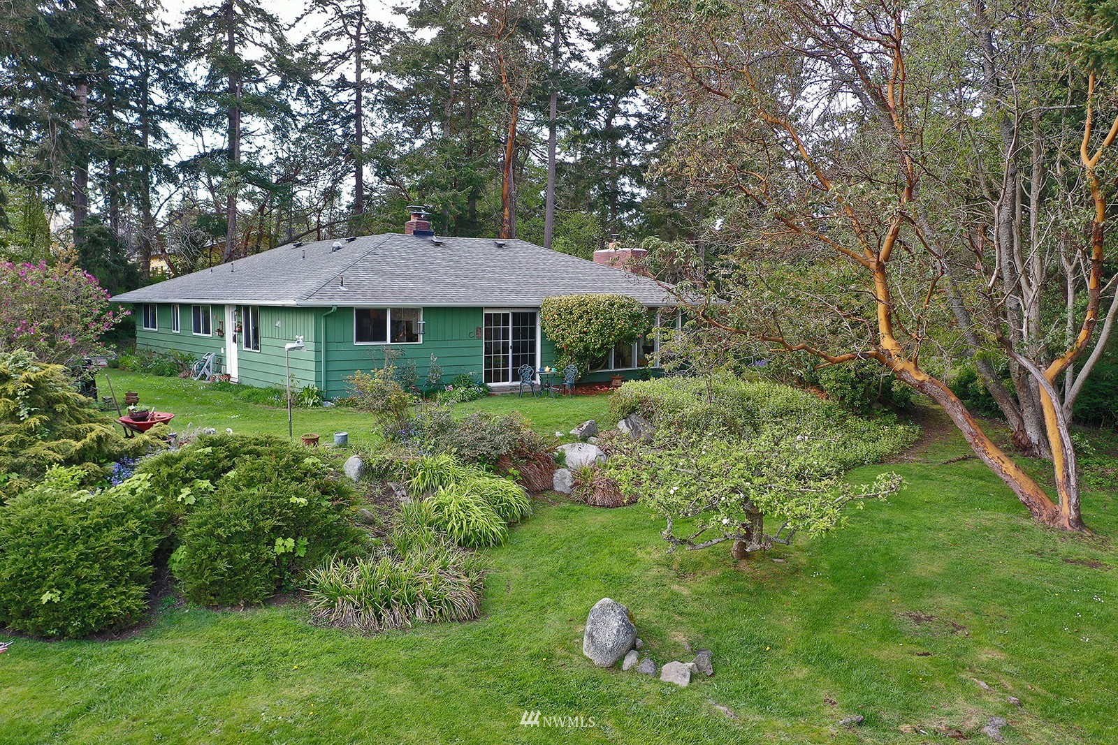 1294 Bonnie View Acres Road Oak Harbor, WA 98277 - Photo 32 of 39 a front view of a house with a yard