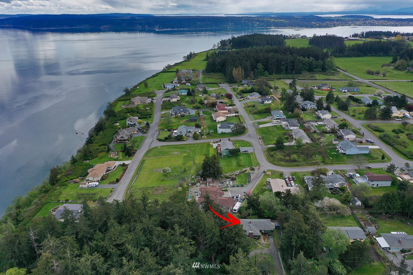 1294 Bonnie View Acres Road Oak Harbor, WA 98277 - Photo 36 of 39 a view of a garden with a lake