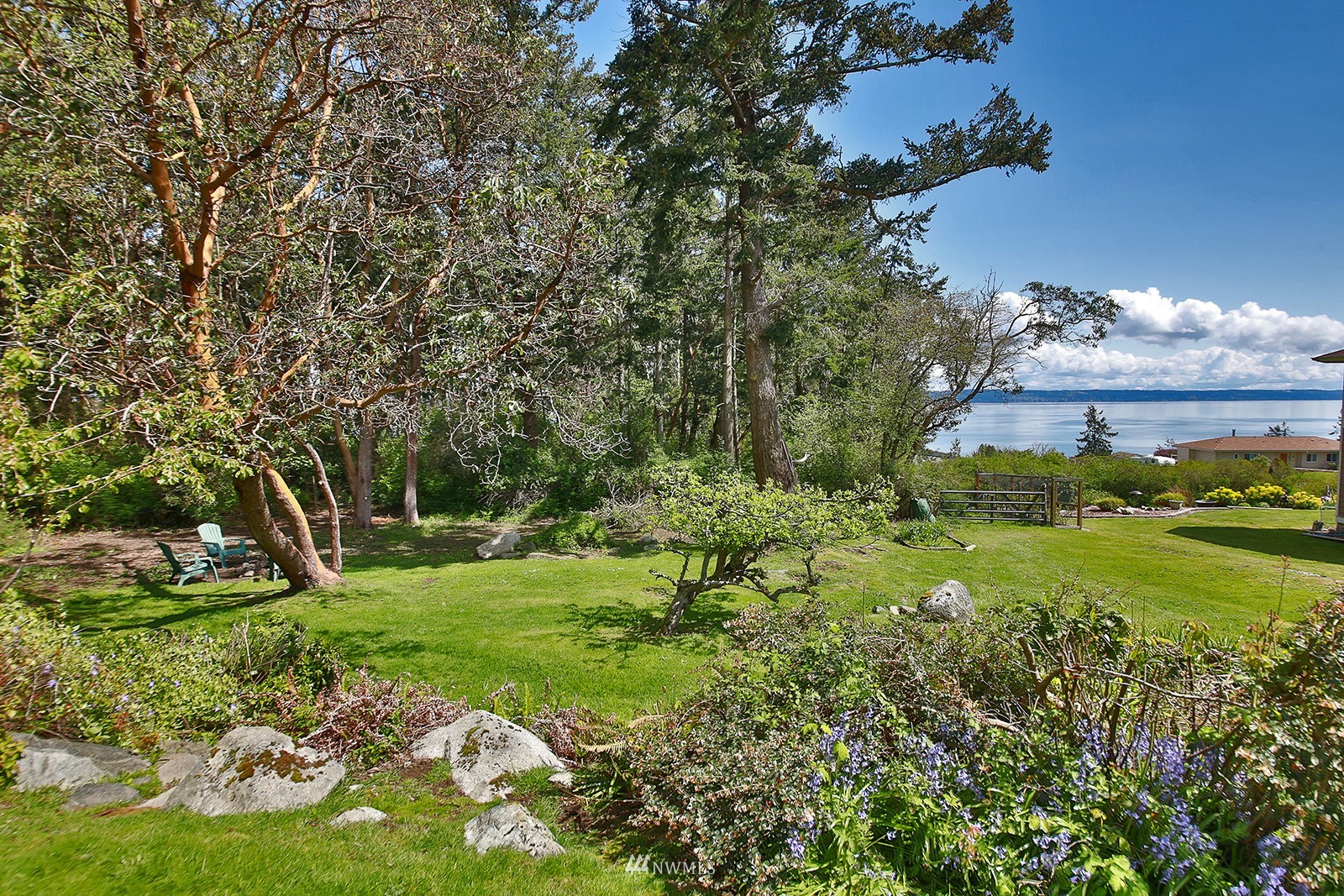 1294 Bonnie View Acres Road Oak Harbor, WA 98277 - Photo 39 of 39 a view of a grassy field with an trees