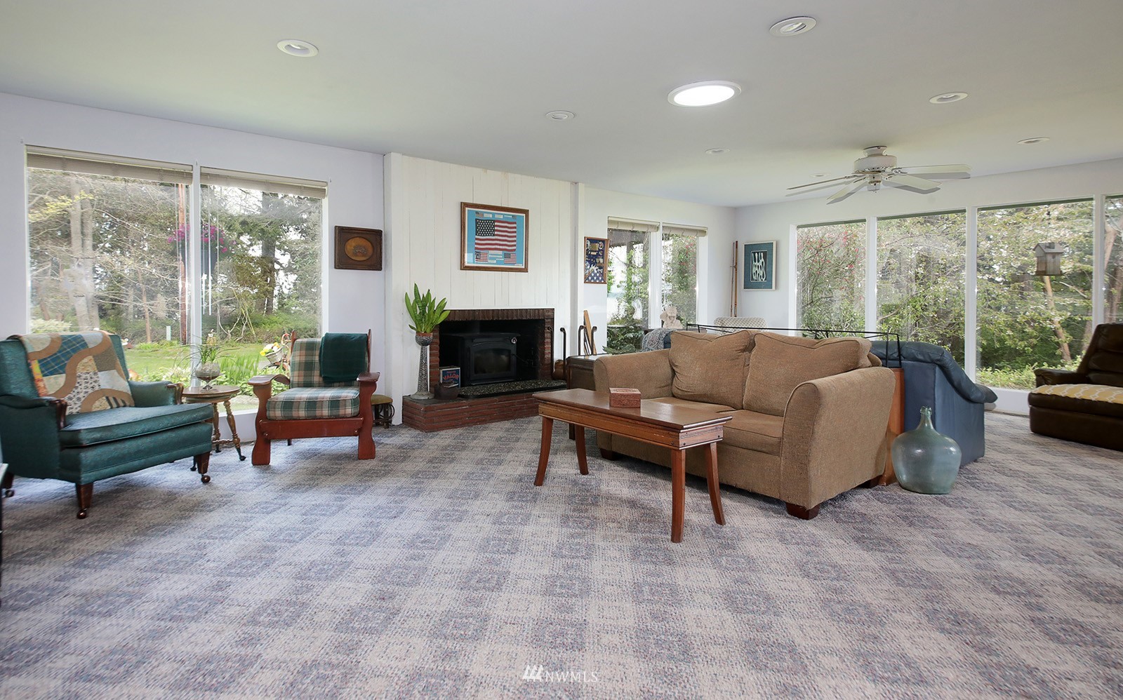 1294 Bonnie View Acres Road Oak Harbor, WA 98277 - Photo 5 of 39 a living room with furniture and a fireplace