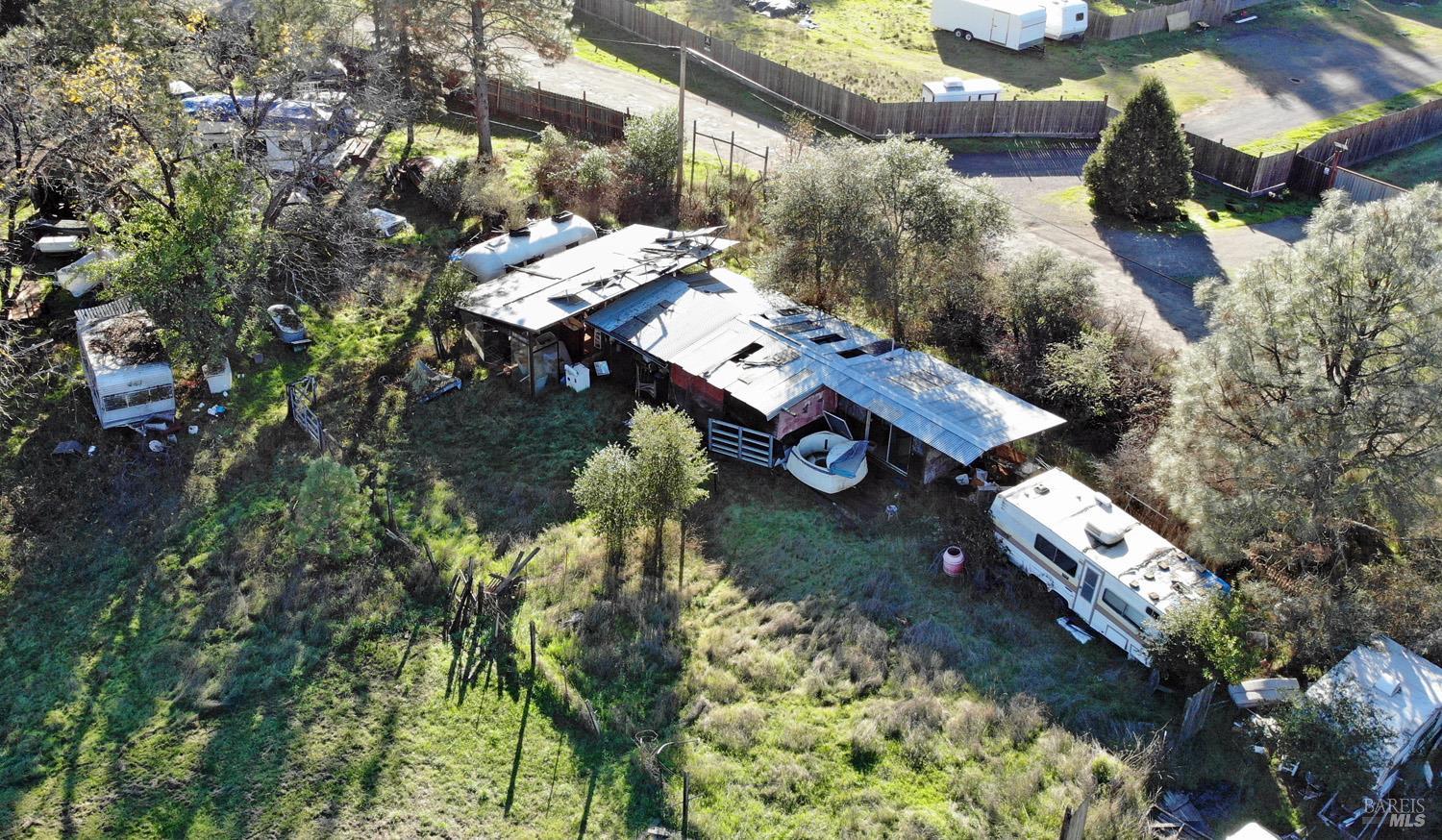 17561 Van Arsdale Road Potter Valley, CA 95469 - Photo 9 of 11 an aerial view of a house with a yard