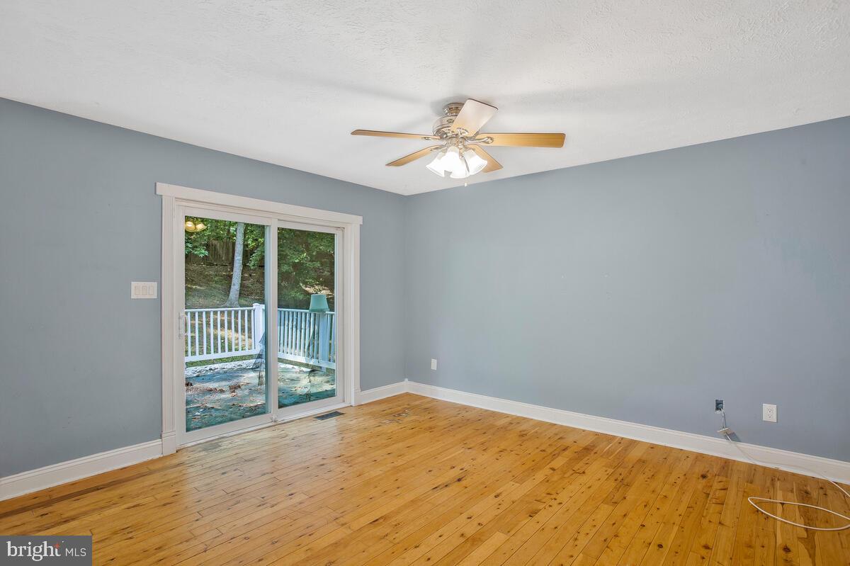 648 Santa Fe Trail Lusby, MD 20657 - Photo 22 of 37 Enter deck off
Family room