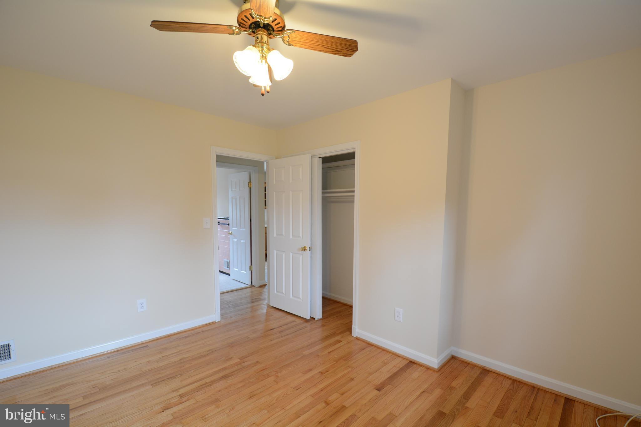 6505 Kalmia Street Springfield, VA 22150 - Photo 16 of 30 a view of empty room with wooden floor
