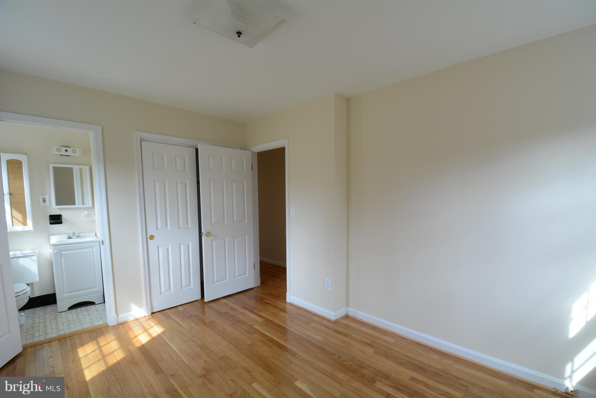 6505 Kalmia Street Springfield, VA 22150 - Photo 19 of 30 a view of a livingroom with wooden floor and a sink