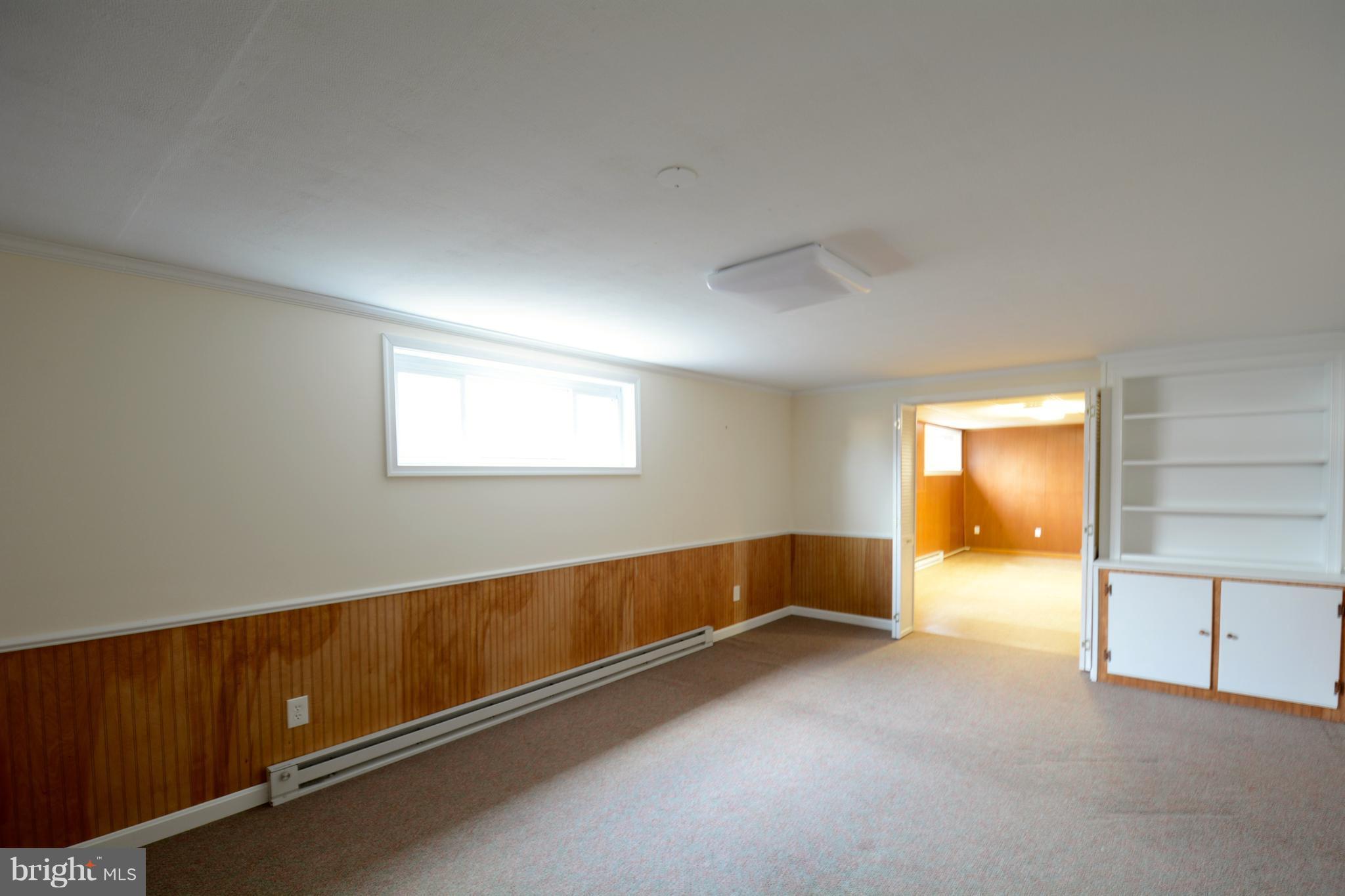6505 Kalmia Street Springfield, VA 22150 - Photo 25 of 30 a view of an empty room with a window
