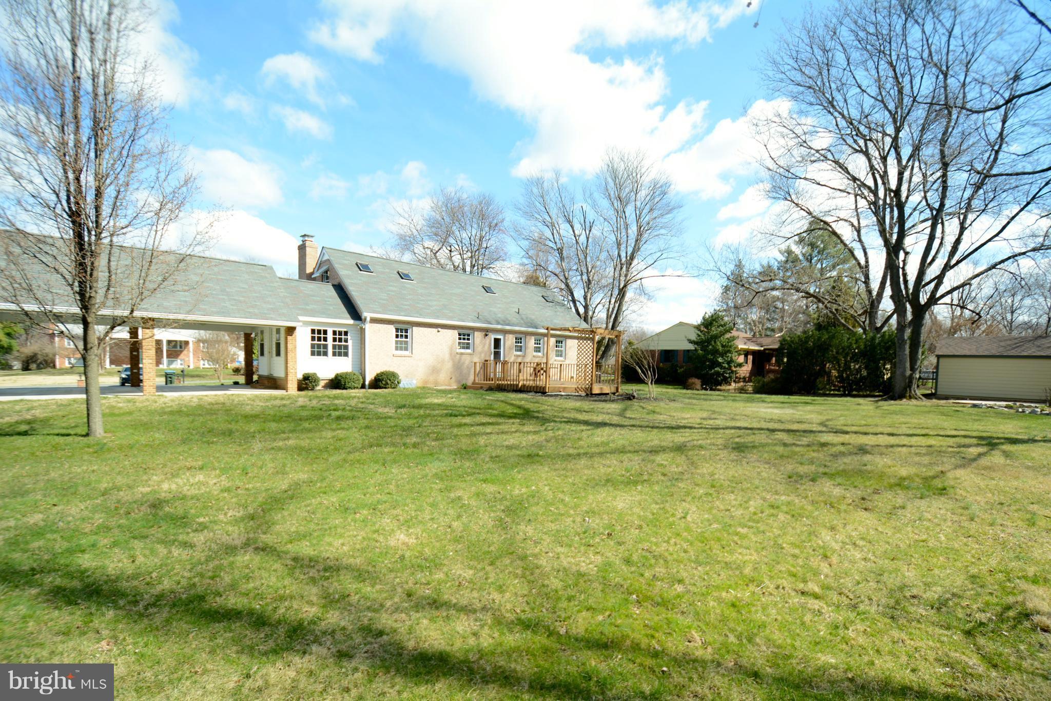6505 Kalmia Street Springfield, VA 22150 - Photo 30 of 30 a front view of house with yard and green space
