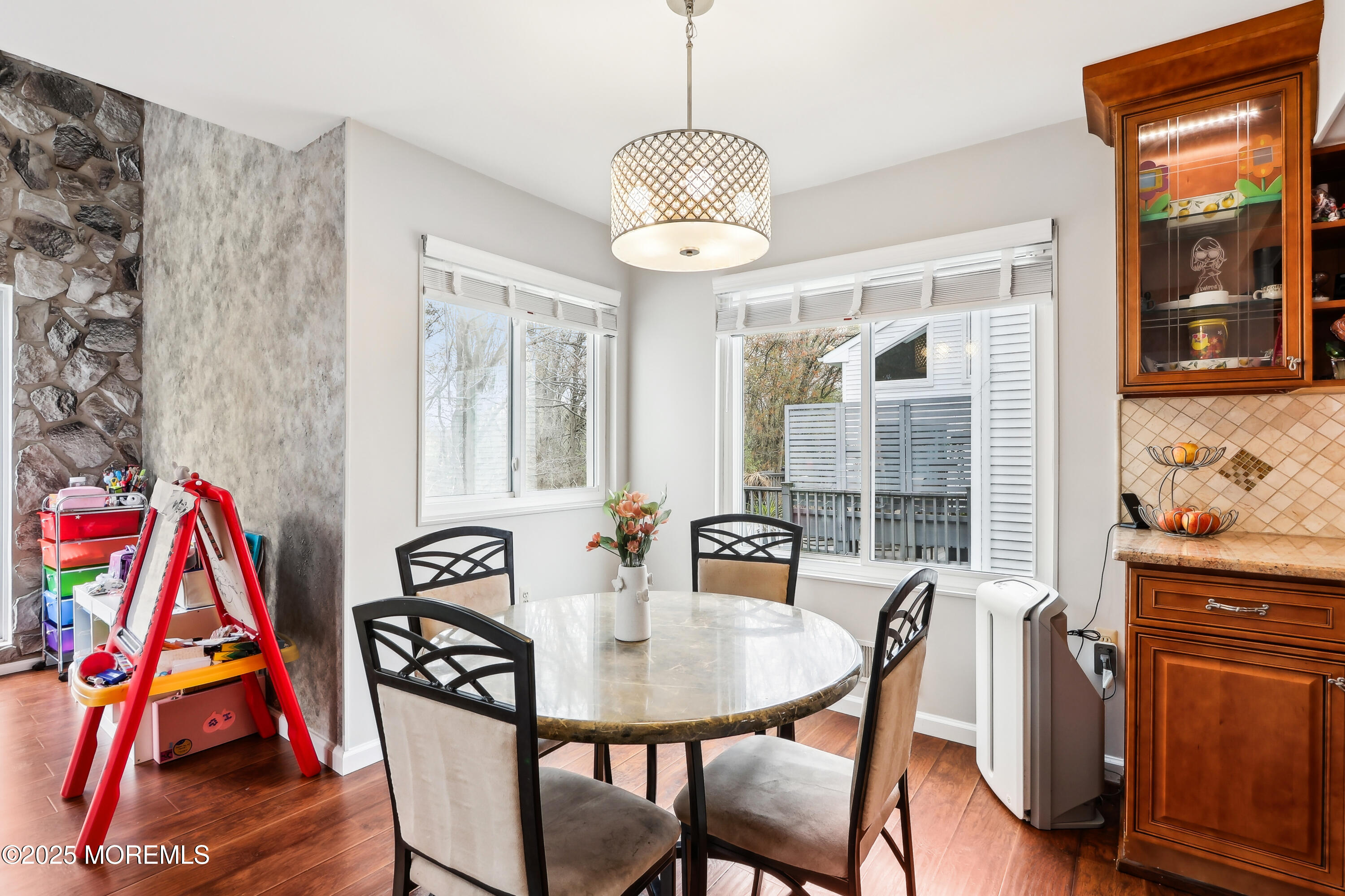 15 Pemberton Drive Matawan, NJ 07747 - Photo 22 of 67 a view of a dining room with furniture and wooden floor