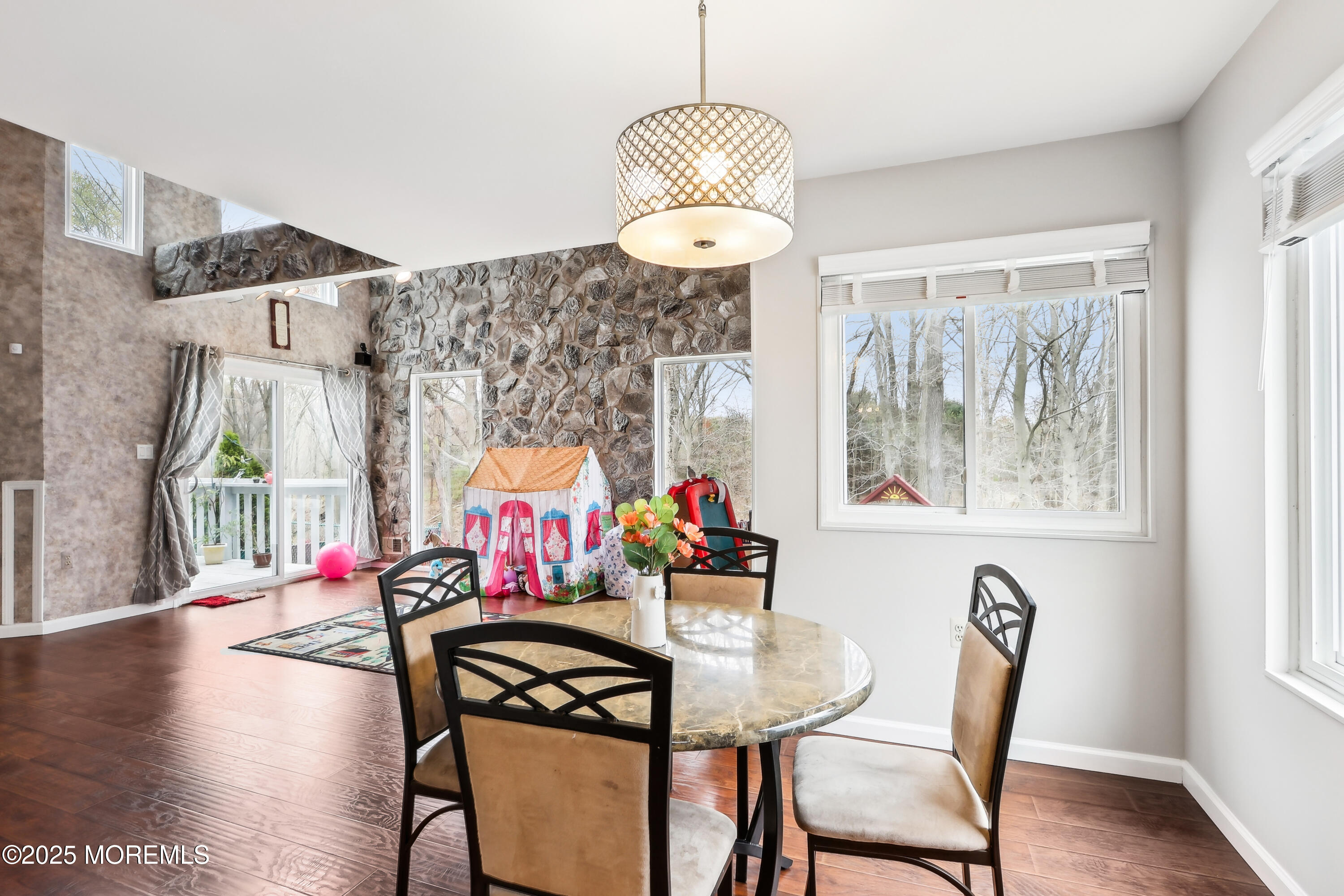 15 Pemberton Drive Matawan, NJ 07747 - Photo 23 of 67 a view of a dining room with furniture window and wooden floor