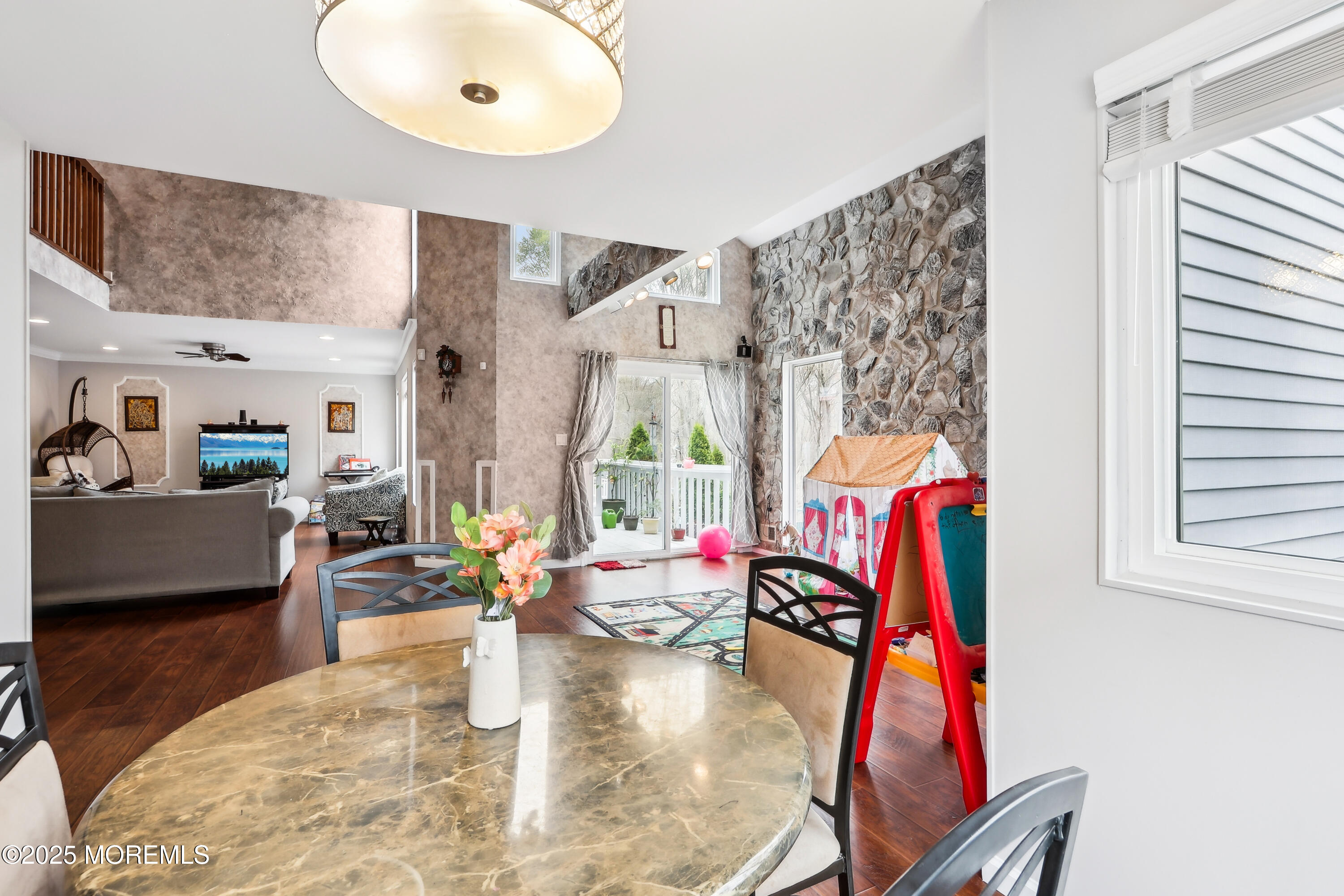 15 Pemberton Drive Matawan, NJ 07747 - Photo 24 of 67 a living room with furniture and a large window