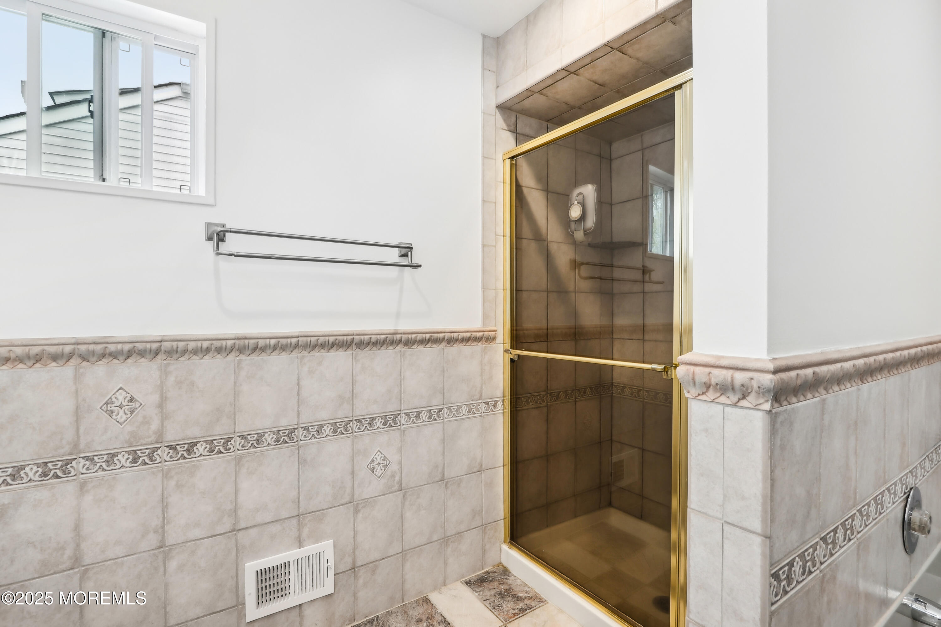 15 Pemberton Drive Matawan, NJ 07747 - Photo 31 of 67 a bathroom with a glass shower door