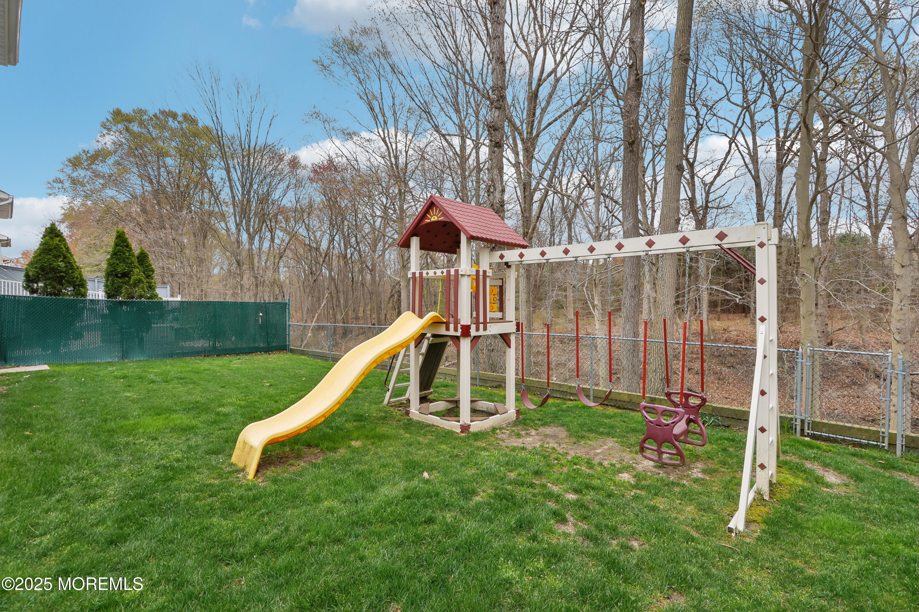 15 Pemberton Drive Matawan, NJ 07747 - Photo 42 of 67 a view of a park with a slide