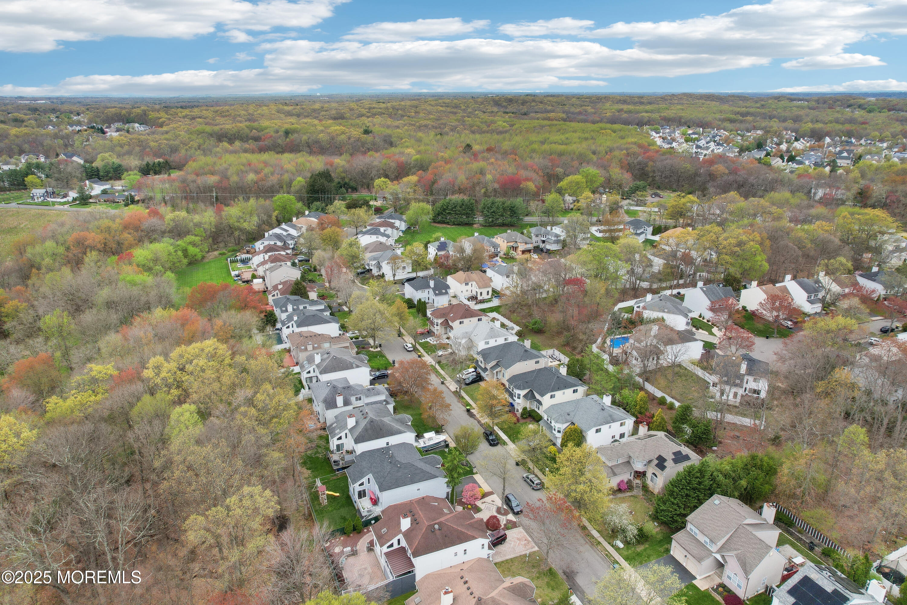 15 Pemberton Drive Matawan, NJ 07747 - Photo 57 of 67 an aerial view of residential houses with outdoor space