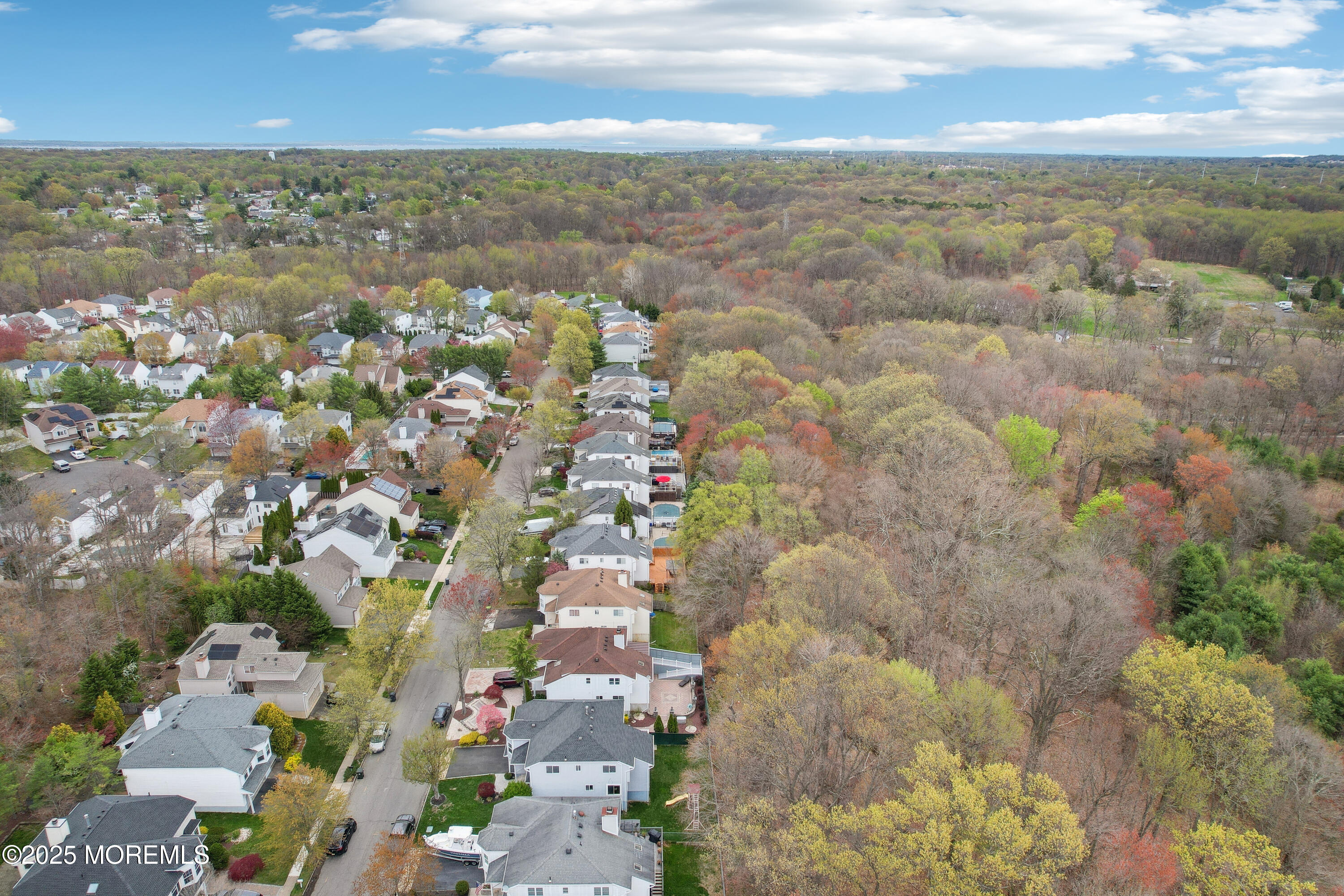 15 Pemberton Drive Matawan, NJ 07747 - Photo 58 of 67 an aerial view of residential houses with outdoor space