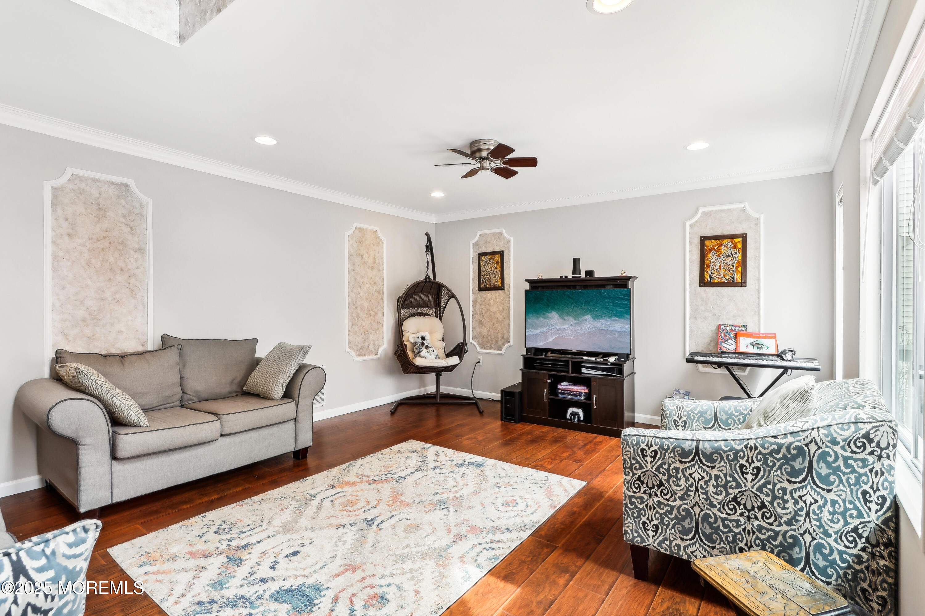 15 Pemberton Drive Matawan, NJ 07747 - Photo 6 of 67 a living room with furniture and a flat screen tv
