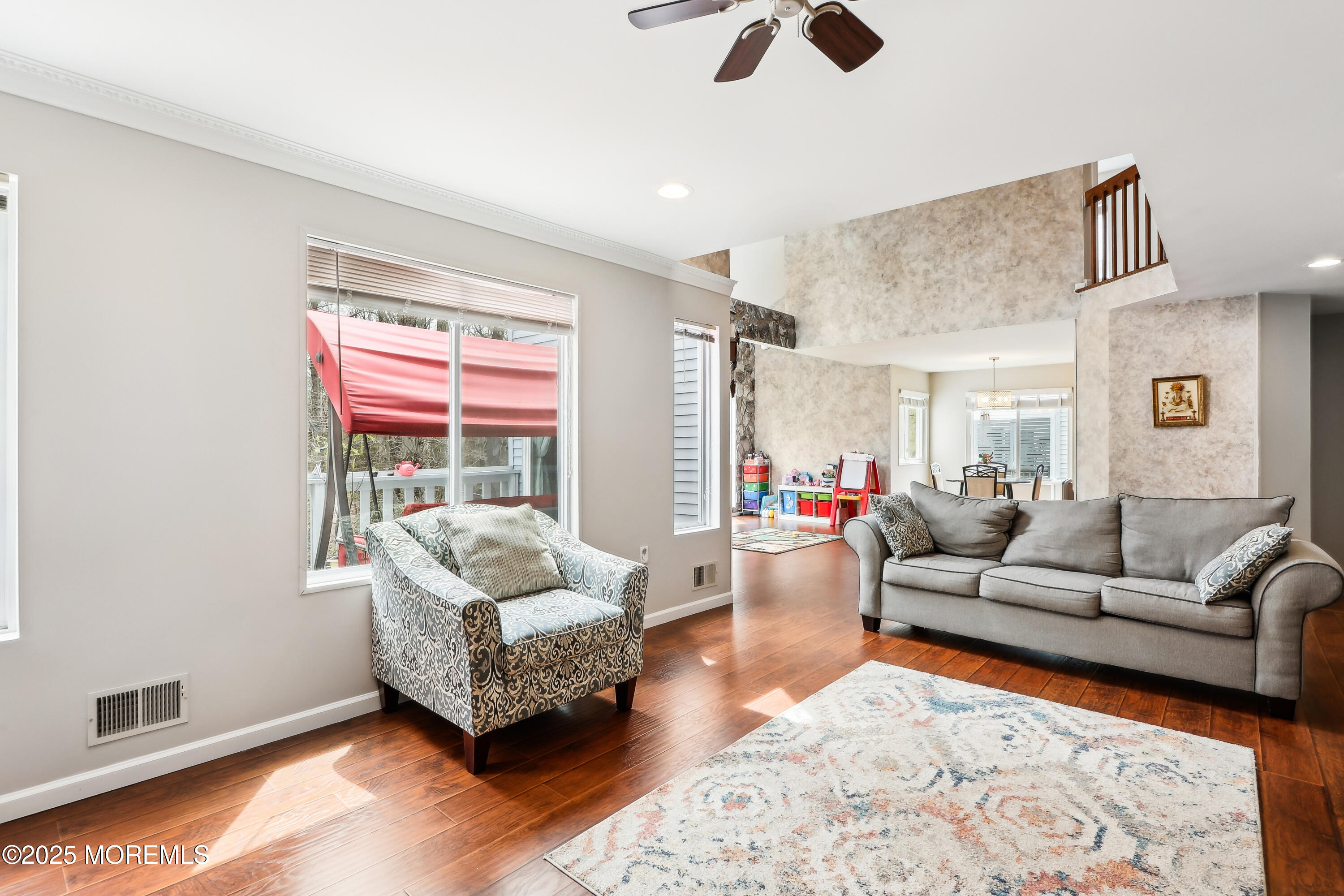 15 Pemberton Drive Matawan, NJ 07747 - Photo 9 of 67 a living room with furniture and a window