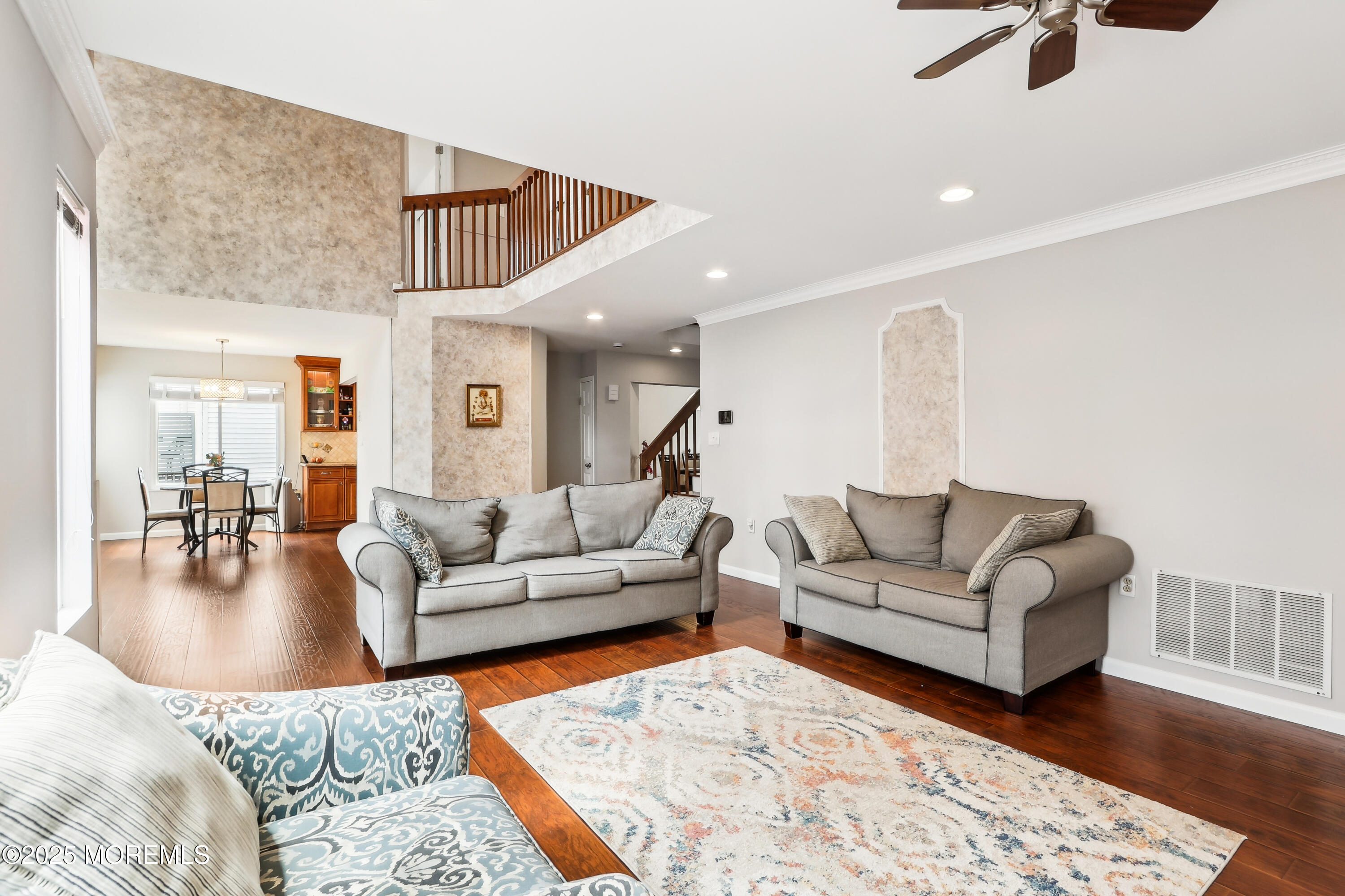 15 Pemberton Drive Matawan, NJ 07747 - Photo 10 of 67 a living room with furniture and a wooden floor