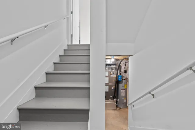 a view of staircase with white walls and white walls
