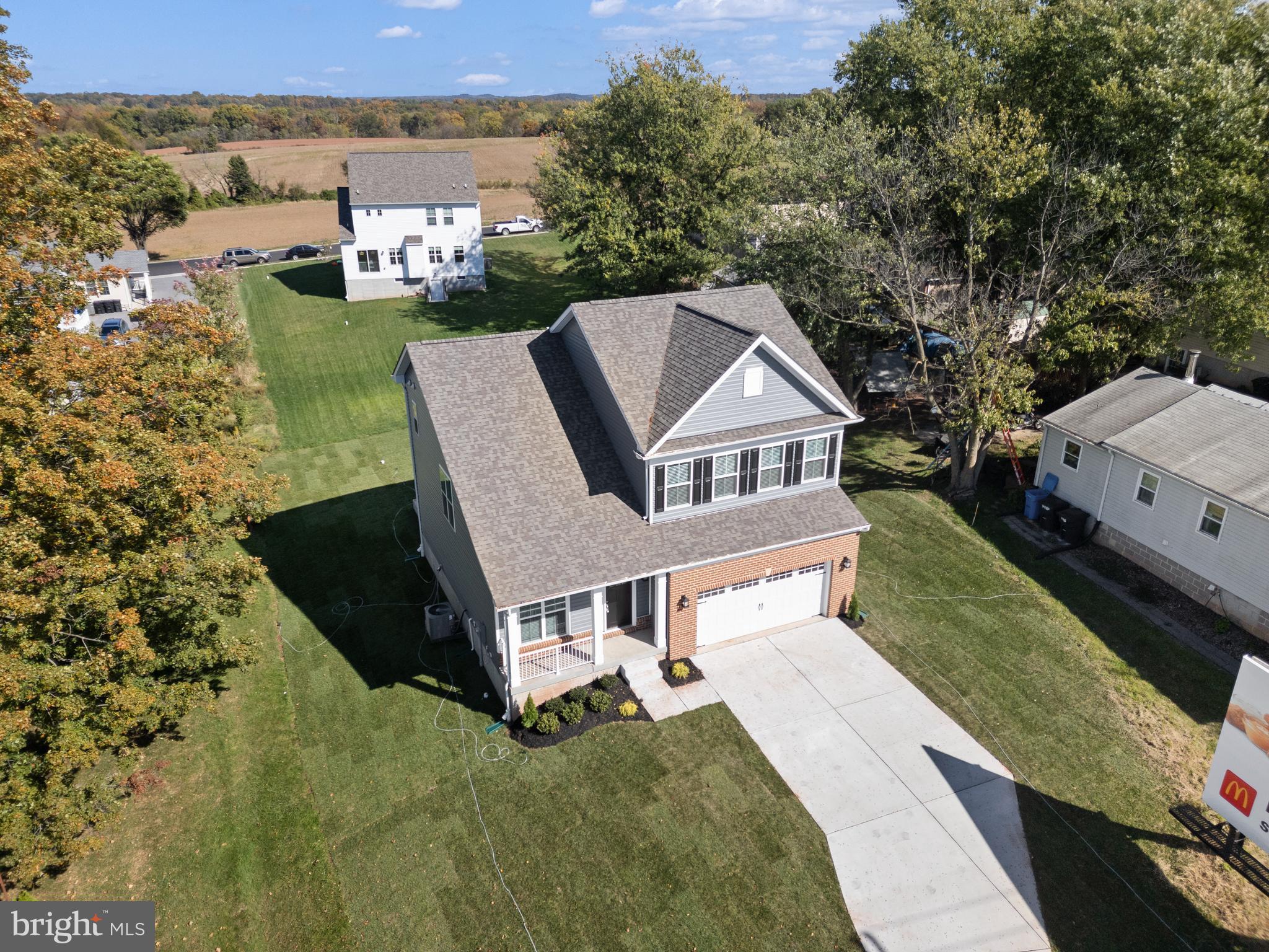148 West Baltimore Street Taneytown, MD 21787 - Photo 3 of 52 an aerial view of a house with a yard