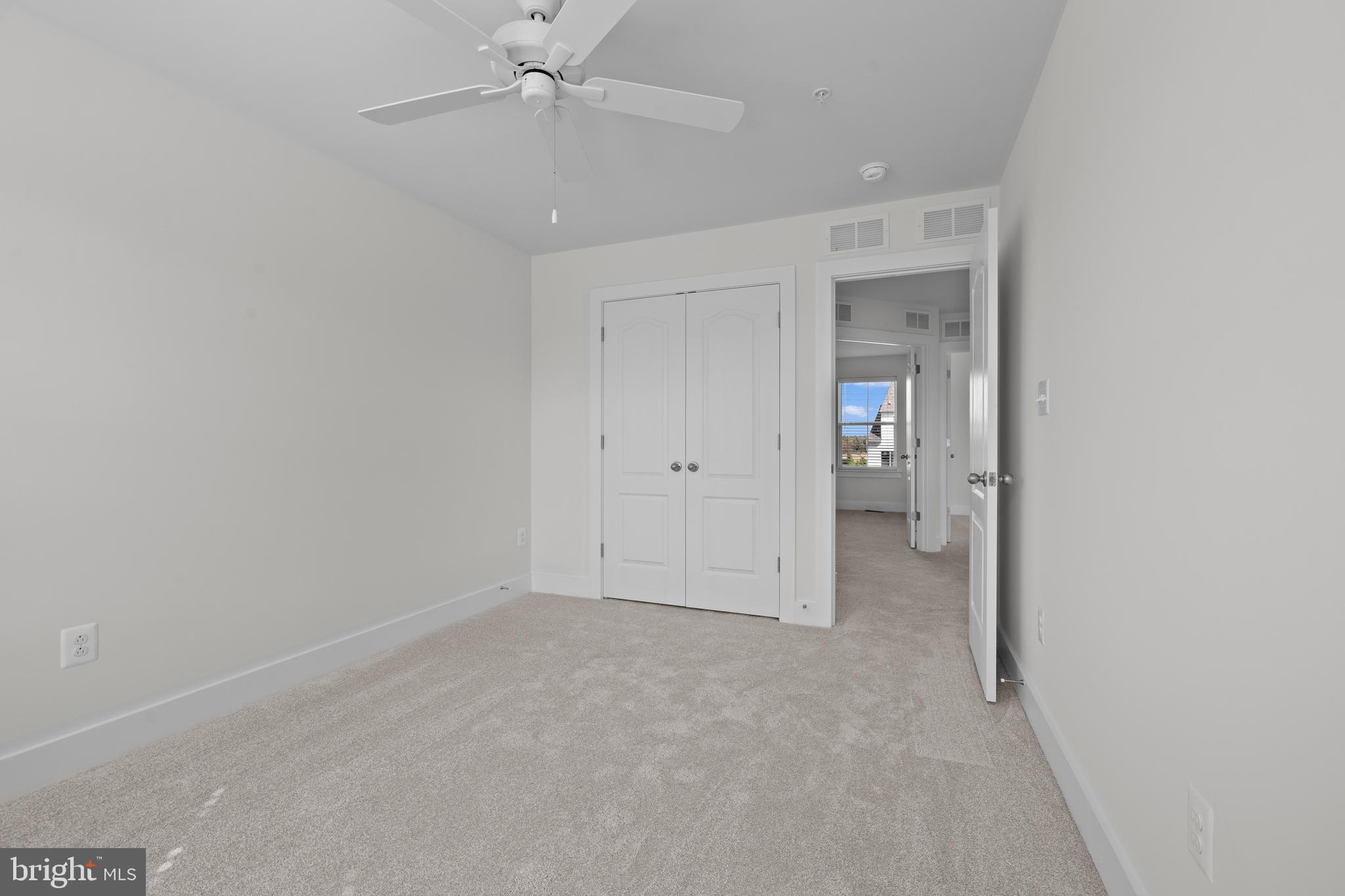 148 West Baltimore Street Taneytown, MD 21787 - Photo 33 of 52 an empty room with fan and entrance