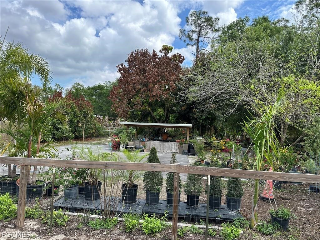 9320 Buckingham Road Fort Myers, FL 33905 - Photo 16 of 19 a view of a balcony with sitting area