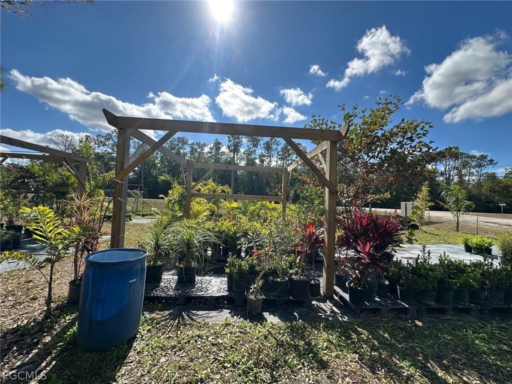 9320 Buckingham Road Fort Myers, FL 33905 - Photo 10 of 19 a view of a fountain in the yard