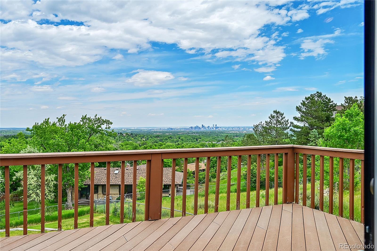 12377 West Louisiana Avenue Lakewood, CO 80228 - Photo 17 of 50 a view of a wooden roof deck