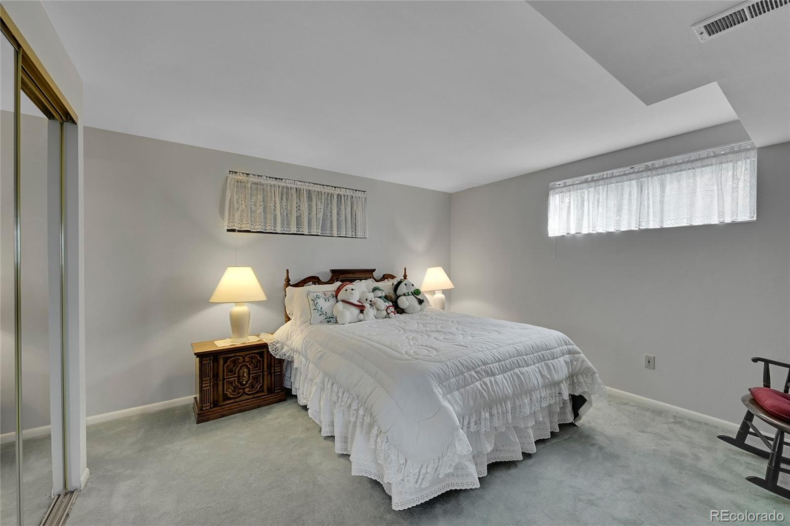 12377 West Louisiana Avenue Lakewood, CO 80228 - Photo 26 of 50 a bedroom with bed and a window