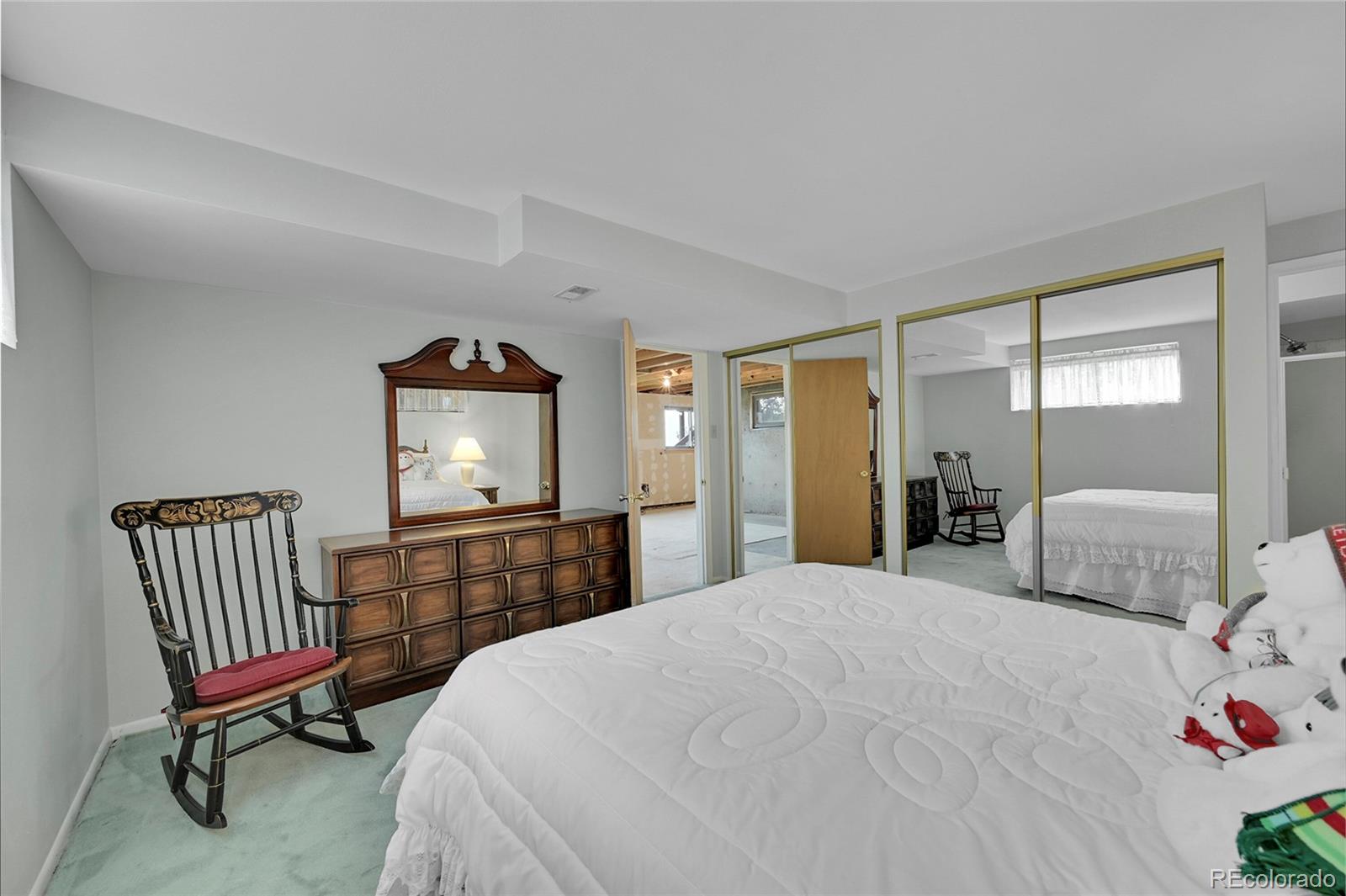 12377 West Louisiana Avenue Lakewood, CO 80228 - Photo 27 of 50 a bedroom with a bed and a window