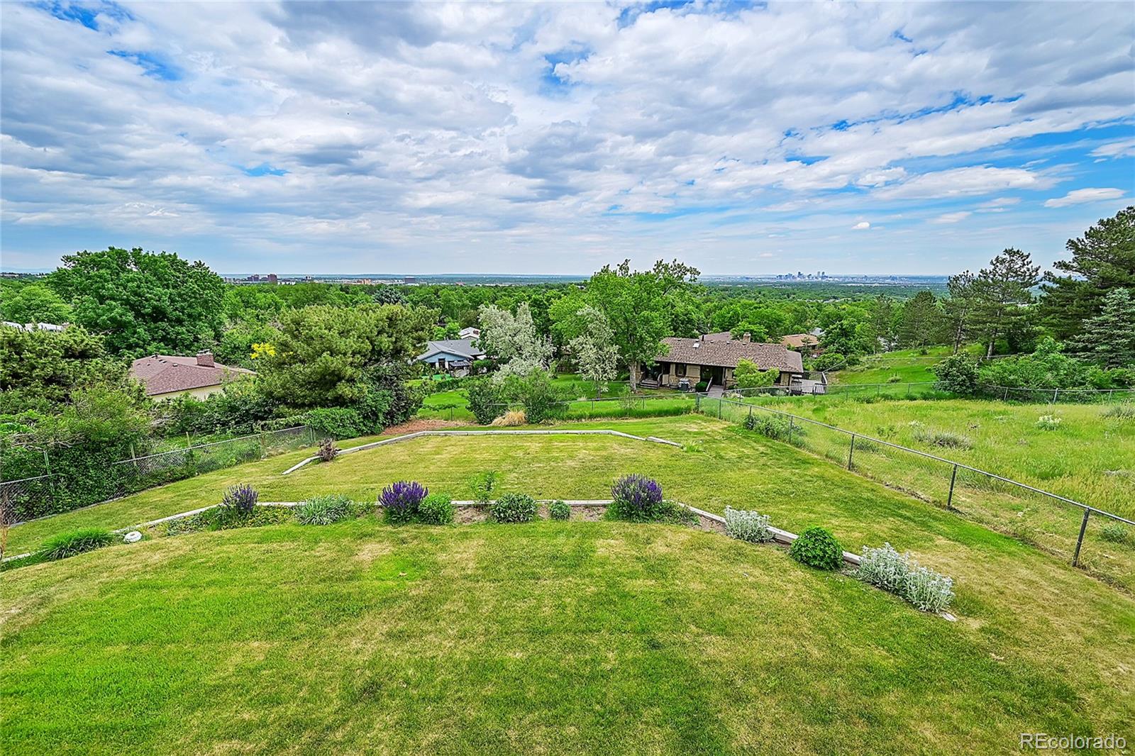 12377 West Louisiana Avenue Lakewood, CO 80228 - Photo 42 of 50 a view of a garden with a building